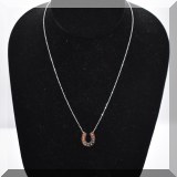 J013. 14K white gold and diamond horseshoe pendant on 17” faceted ball chain - $175